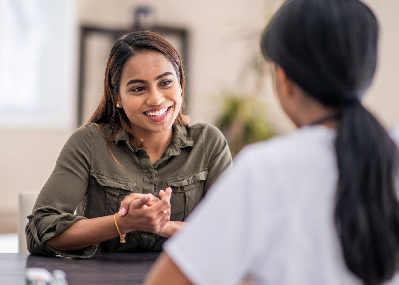 Patient talking with a pharmacist.