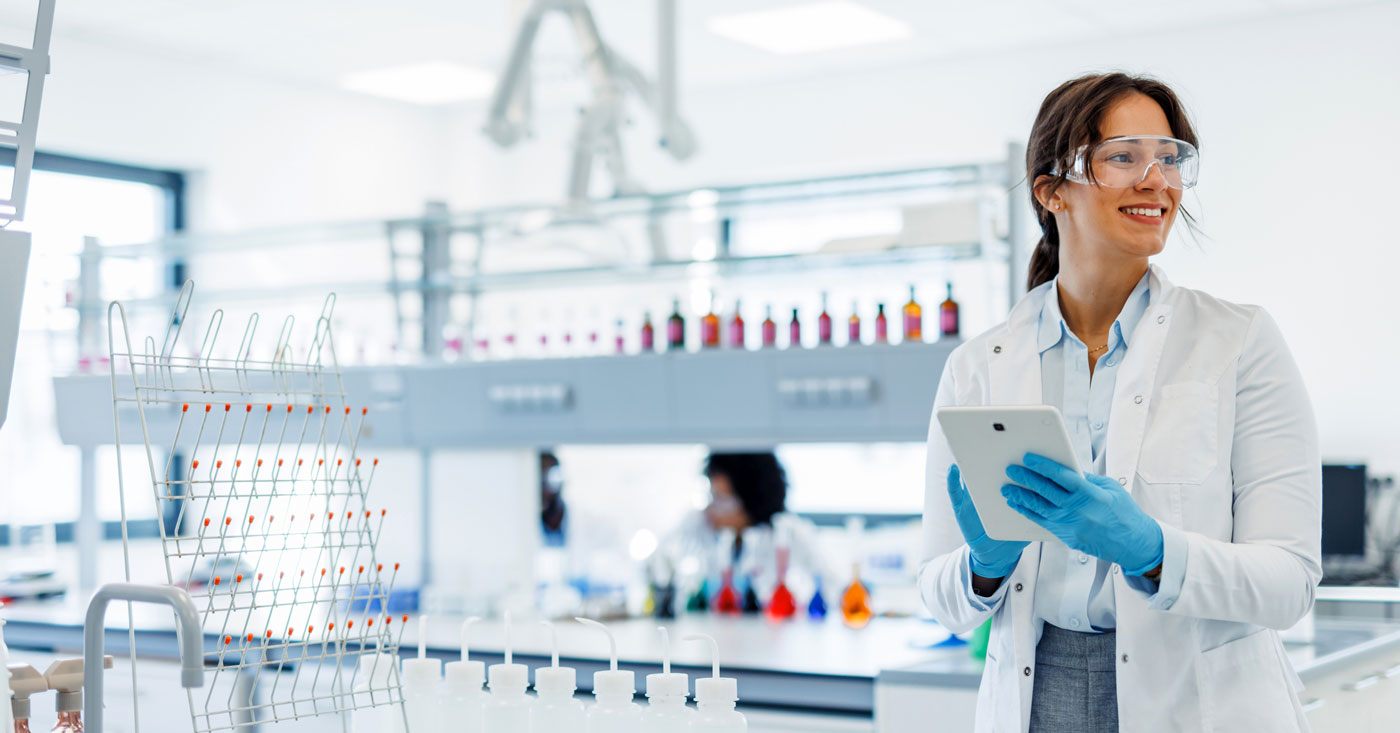 Female pharmacist working in a lab.