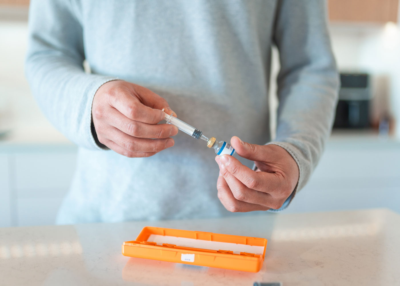 Man preparing injection.