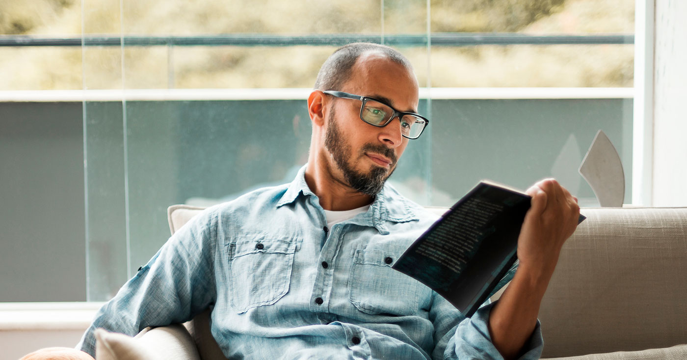 Man reading a book.