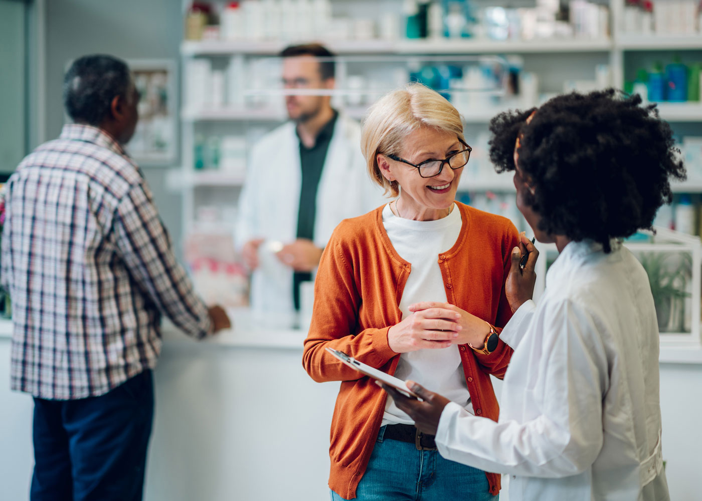 People picking up prescriptions.
