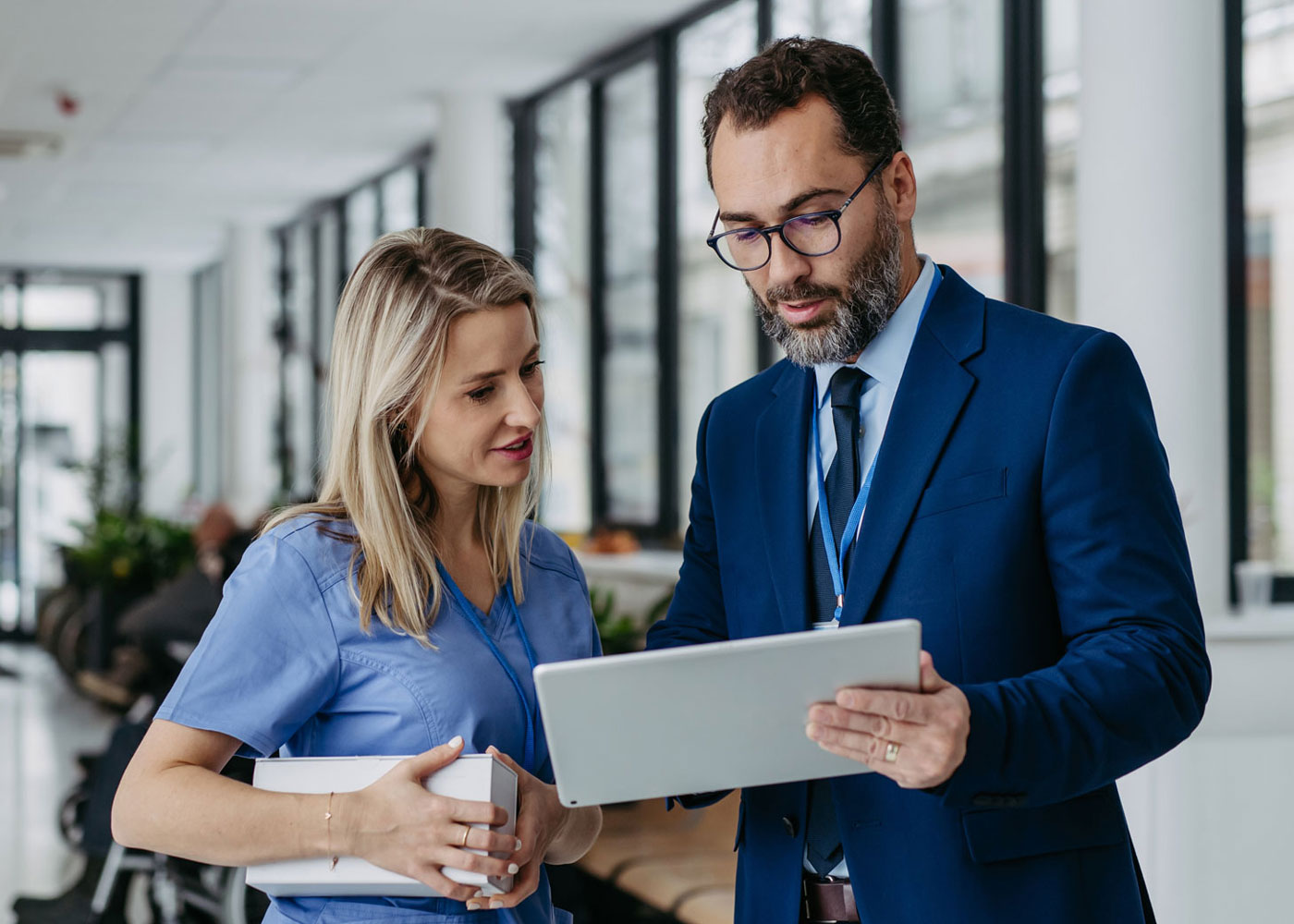 Pharmacist working with a patient.