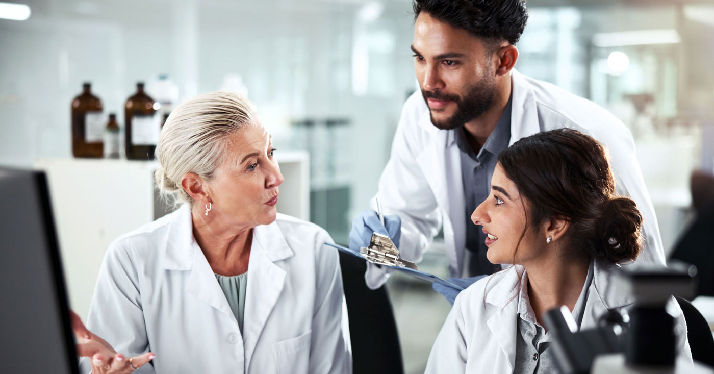 Pharmacists working in lab.