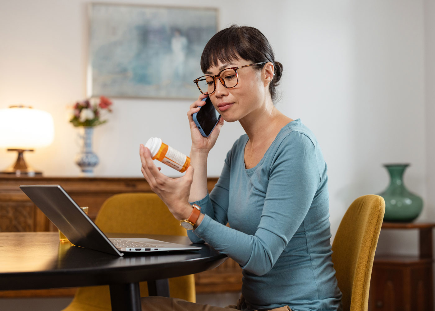 Woman calling pharmacy.